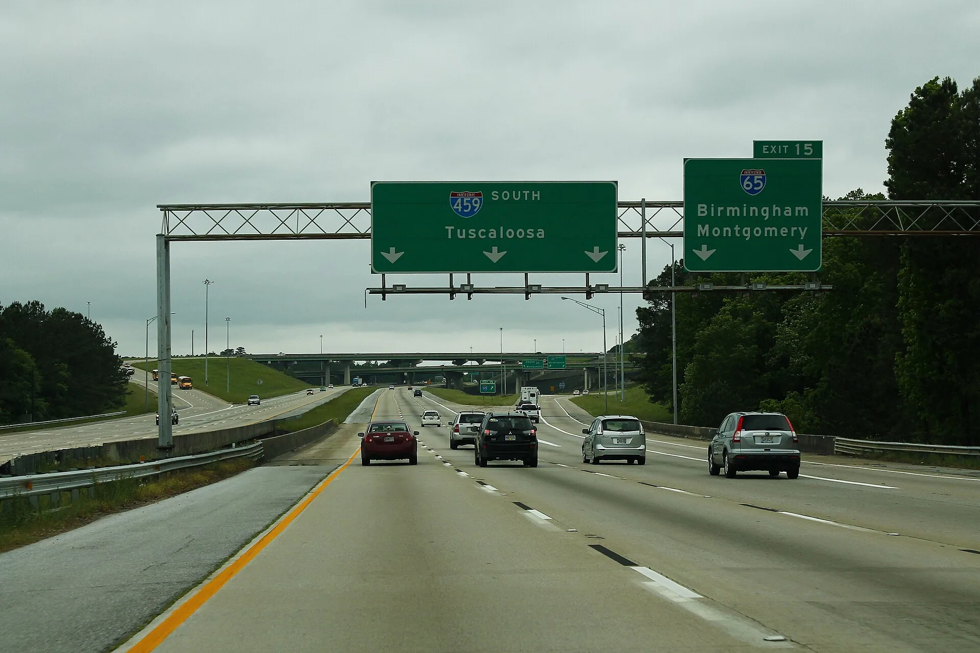 Overhead signs on southbound I-459 in Hoover at exit 15, where drivers split for I-65 toward Birmingham and Montgomery.