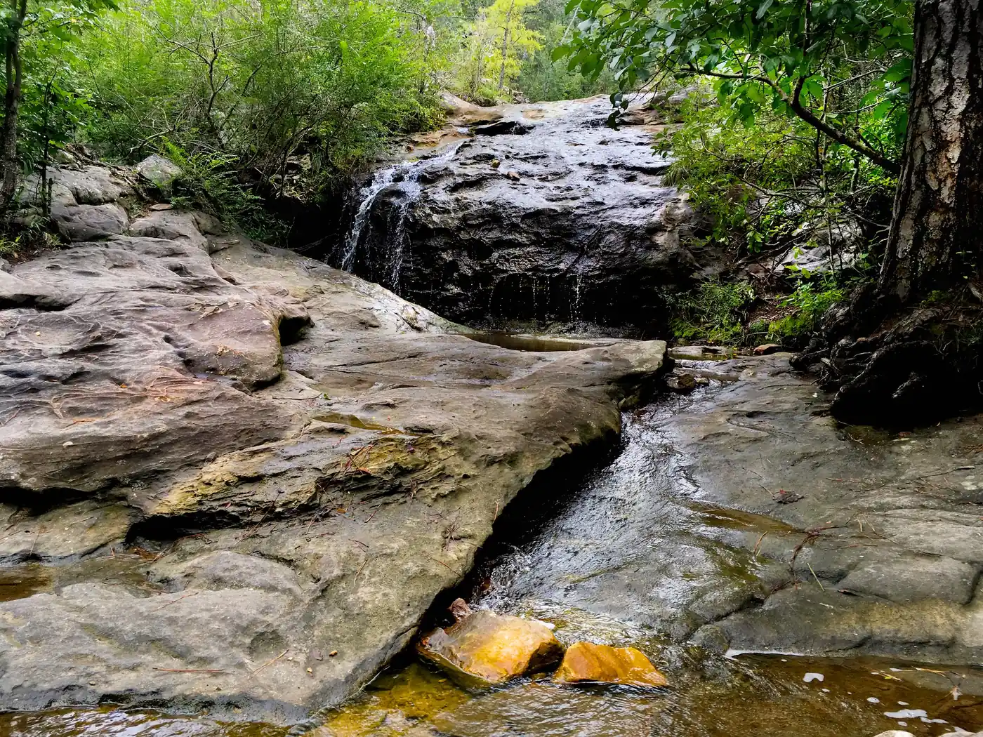 A small waterfall spills over sandstone ledges at Moss Rock Preserve in Hoover.
