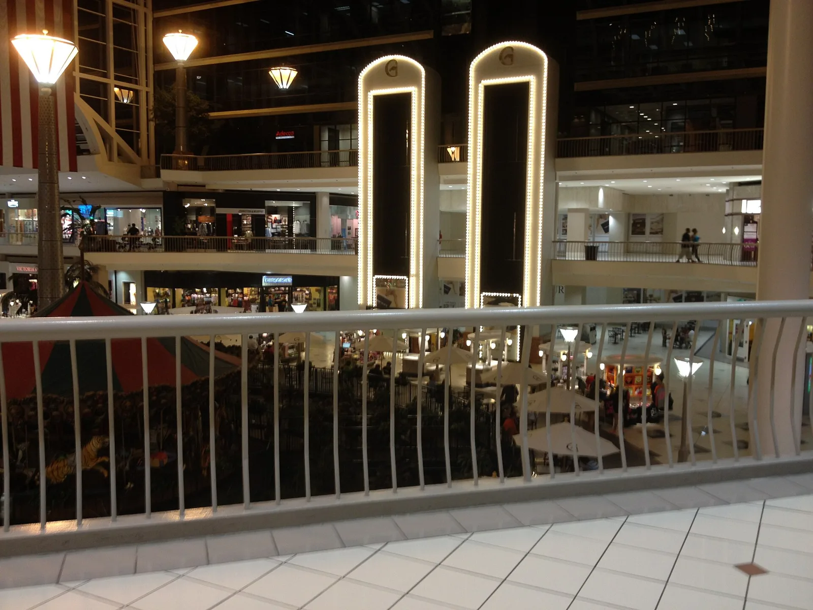 Tables and umbrellas in the food court below the upper level of the Riverchase Galleria in Hoover.