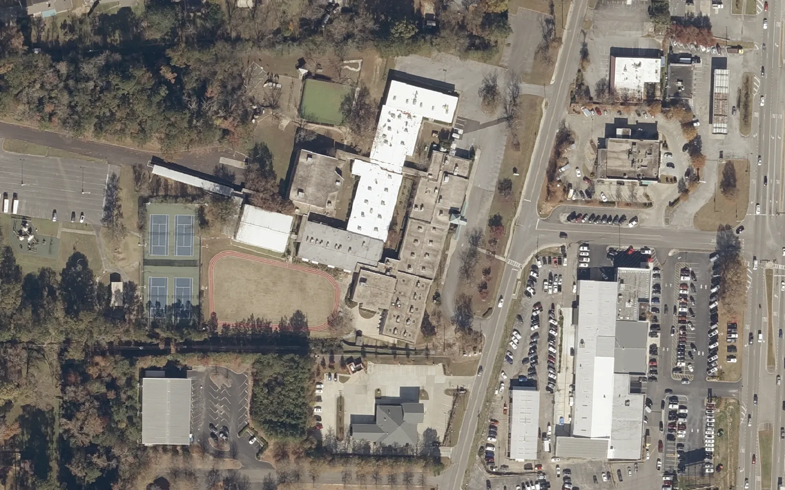 Aerial view of Green Valley Elementary School on Old Columbiana Road in Hoover, with its tennis courts and the shopping centers along U.S. 31 to the east.